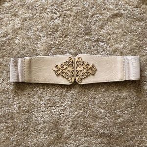 Tan and gold stretchy belt by Francesca’s